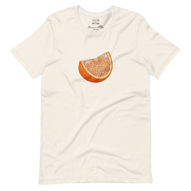 A minimalist short sleeve t-shirt featuring a cross hatch colored pencil illustration of a vibrant sugared orange slice.