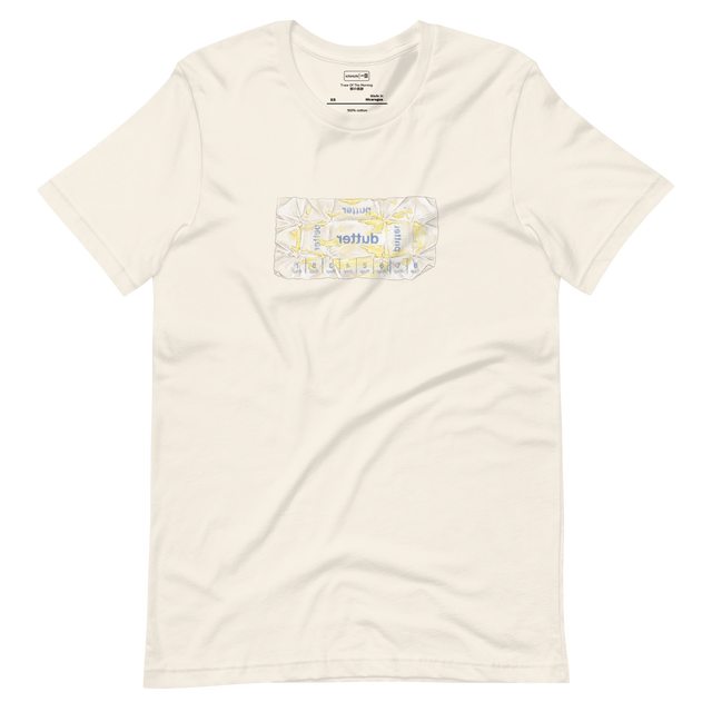 Short Sleeve T-Shirt featuring a hand-drawn colored pencil illustration of an open butter wrapper with yellow smears and reversed blue text.